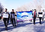 Rights Activists March to Demand Peace, Justice